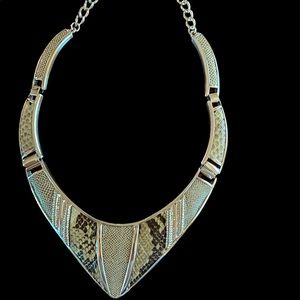 BCBG Max Azria Necklace, faux snakeskin pattern and silver tone.